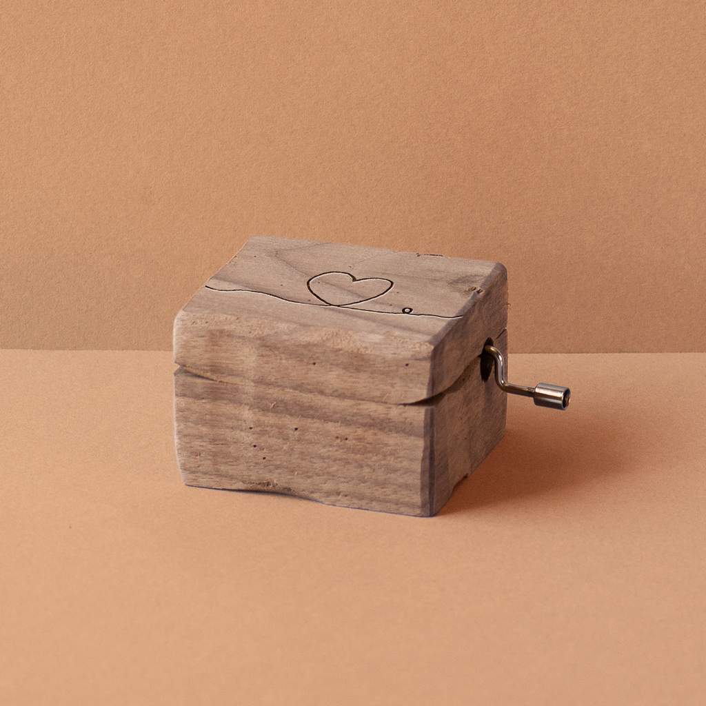 Walnut wood music box with a heart and the thread of fate